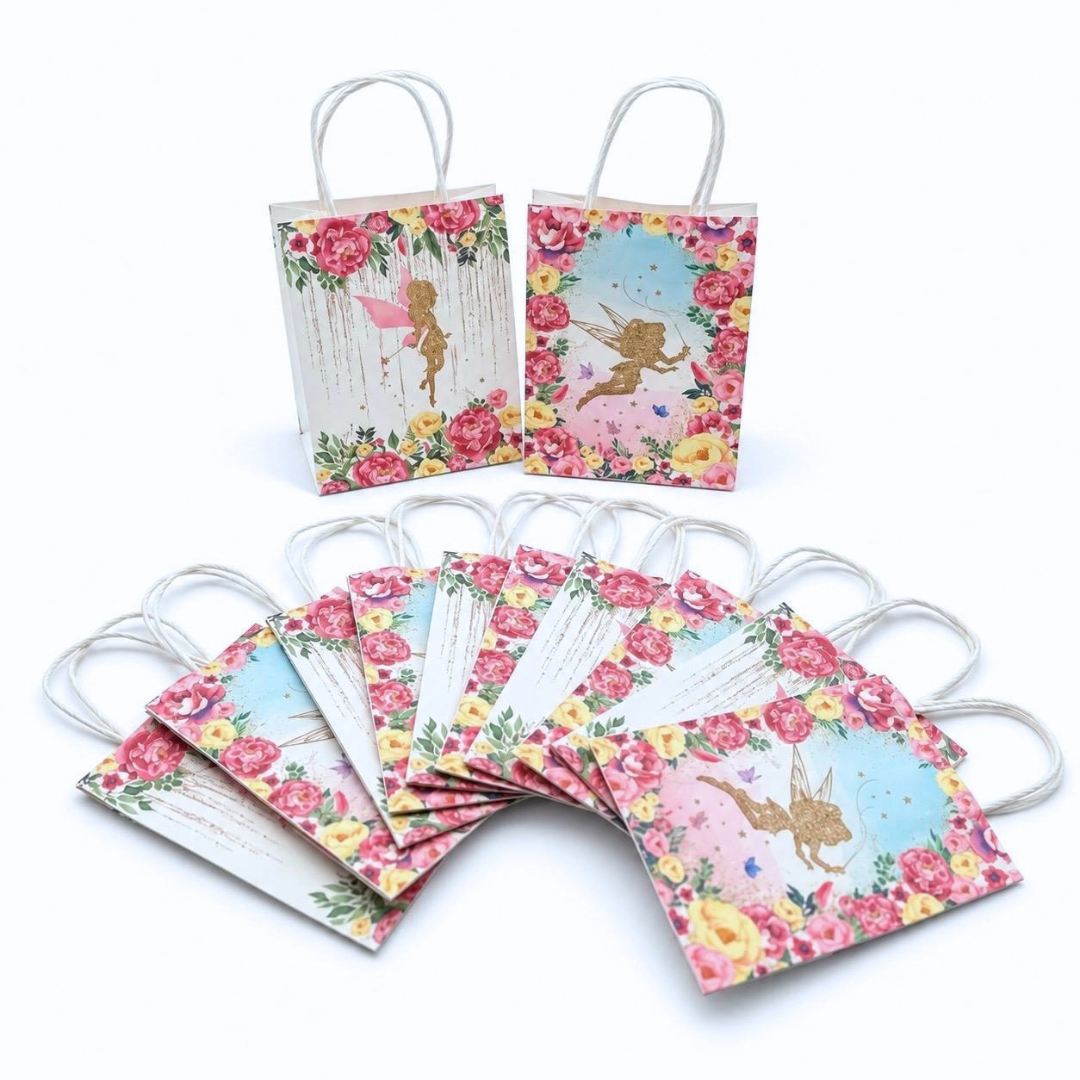 a set of 12 gift bags with white twisted paper handles, decorated with colorful floral borders and gold fairy illustrations, shown on a plain white background.