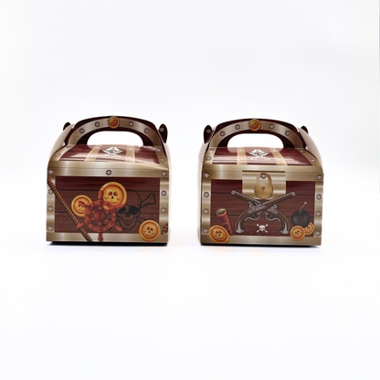 2 pirate treasure chest favor boxes showing two additional assorted designs on a white background