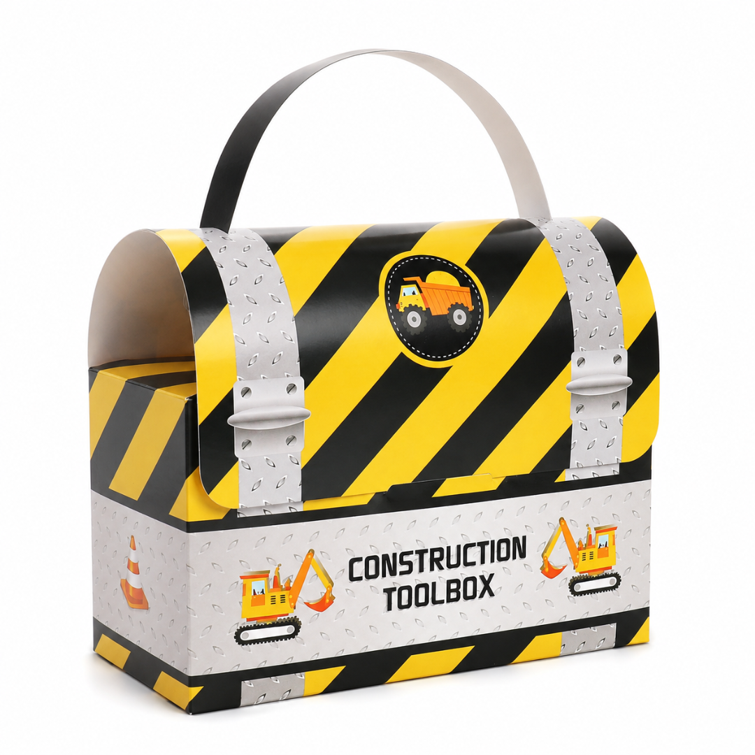 A construction-themed toolbox party box with a black and yellow striped pattern, silver faux-metal straps, a carrying handle, and printed construction vehicle graphics on a white background.