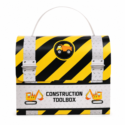 A construction-themed storage box or toolbox with a white handle, featuring bold black and yellow diagonal hazard stripes, silver faux-metal strap details, and cartoon construction vehicles including an orange dump truck and yellow excavators. The front has a white band with the text 'CONSTRUCTION TOOLBOX' and small vehicle illustrations.