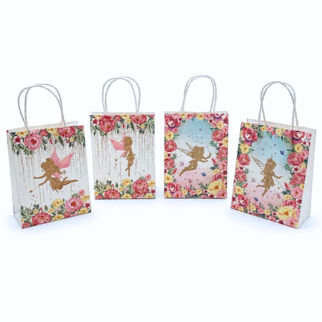 Four decorative paper gift bags with white handles, featuring fairy illustrations and floral borders in pink, red, yellow, and blue on a white background.