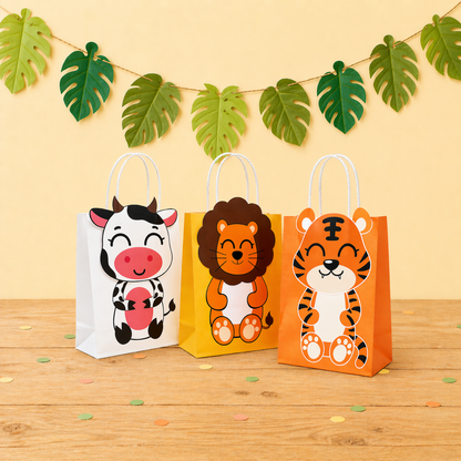 Three animal-themed paper bags on a wooden surface with a decorative leaf garland in the background.
