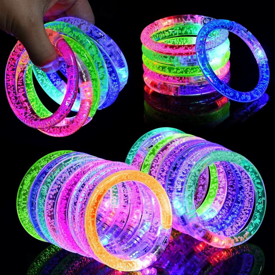 Colorful LED bracelets on a black background