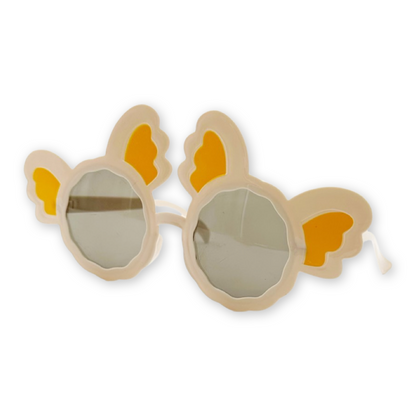 A pair Mickey Mouse-themed sunglasses in white color with black lenses and cartoonish designs.