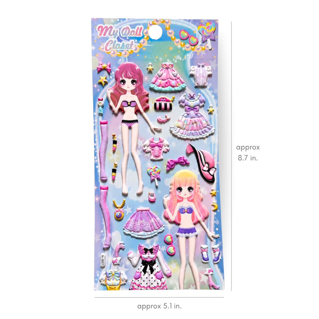 My Doll Class! sticker sheet featuring two cartoon dolls with pink and blonde hair, surrounded by colorful dresses, accessories, and stars on a light blue background. The image includes dimension labels indicating the sheet is approximately 8.