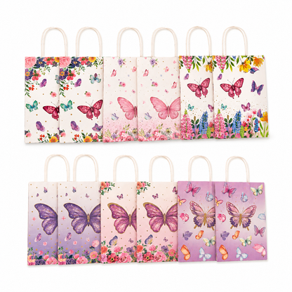 Eight paper gift bags with white handles, arranged in two rows of four. The bags feature various pastel butterfly and floral designs in pink, purple, blue, and orange on light cream and lavender backgrounds.