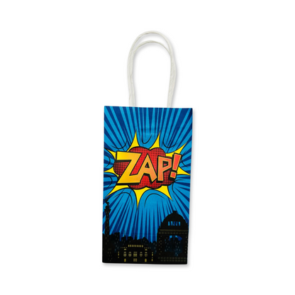 blue comic style paper favor bags with handles featuring comic words zap on a white background.