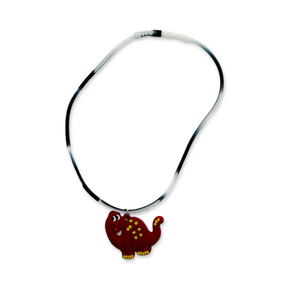 A silicone rubber necklace with maroon dinosaur design.