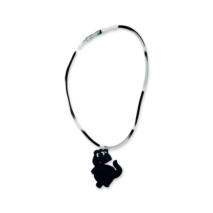 A silicone rubber necklace with black dinosaur design.