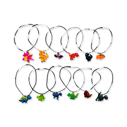 A set of 10 silicone rubber necklaces with various colorful dinosaur designs.