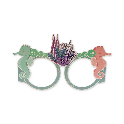 mermaid-themed paper glasses on a white background
