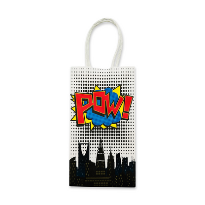 white comic style paper favor bags with handles featuring comic words pow on a white background.